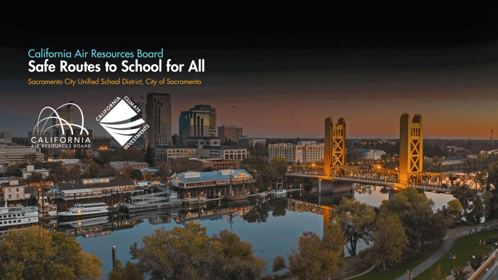 Sacramento cityscape with bridge and logos.